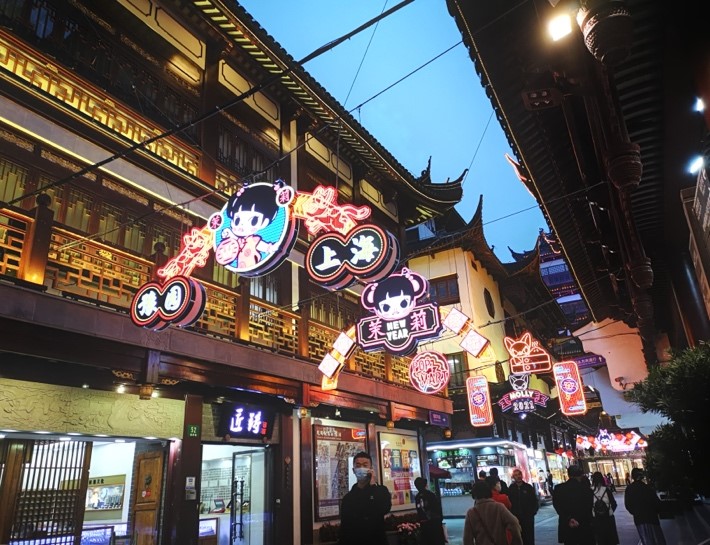 A picture containing text, building, outdoor, streetDescription automatically generated