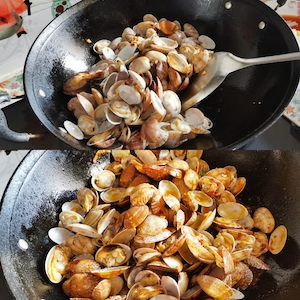 Add the steamed, opened clams to the sauce