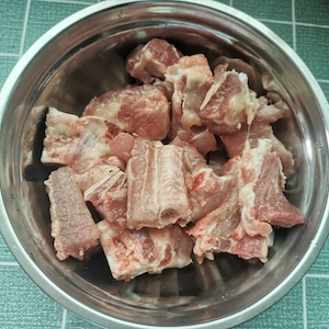 You can have your butcher chop the pork ribs into small pieces.