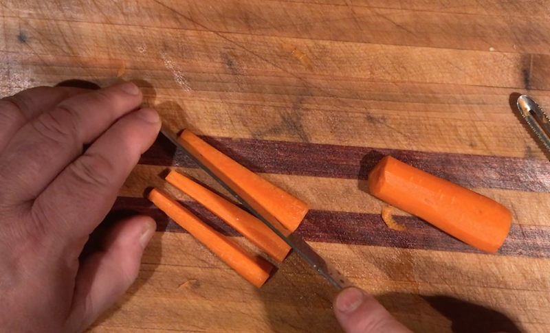 Cut the carrots into sticks and trim off the rounded edges