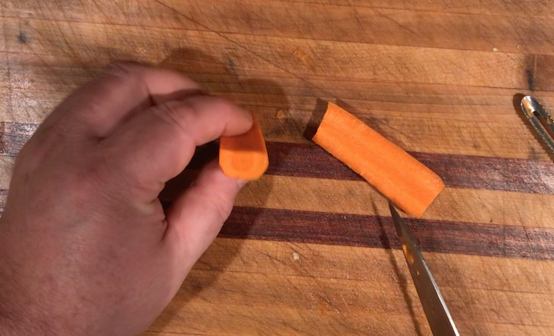 Square the carrots by trimming the rounded sides