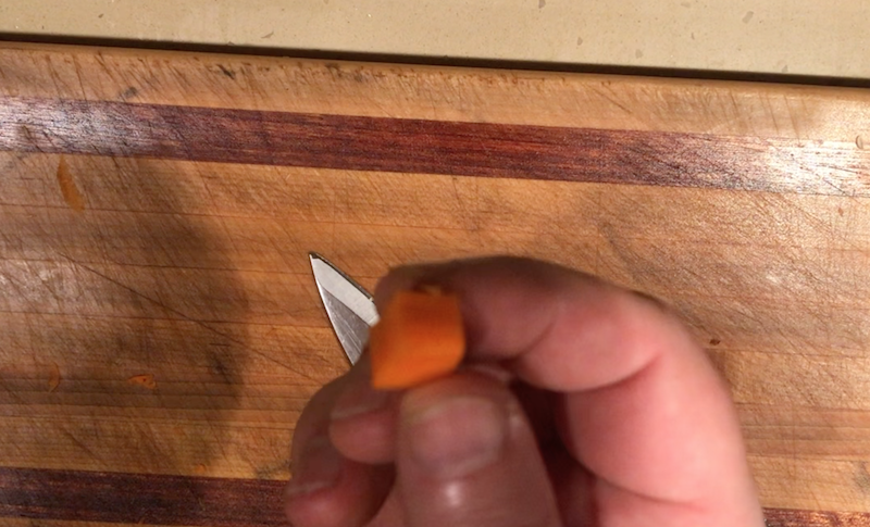 Dice carrots into cubes for fancy presentation