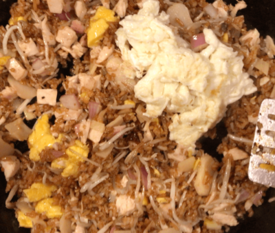 Add the egg white and diced chicken, stir-fry to combine