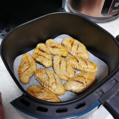 Place the wings in the air fryer for 10 minutes