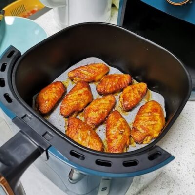 turn the wings and set the fryer for an additional ten minutes, coat wings with honey if you want a crispy, sweet skin