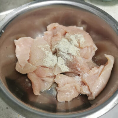 Add cornstarch to the pork and stir to coat evenly