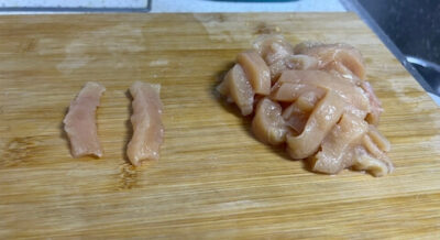 cut the chicken into strips