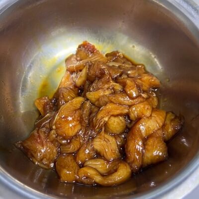 add salt, then dark soy sauce to the chicken