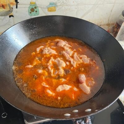 boil the pork in the broth