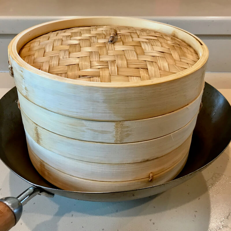 12-inch bamboo steamer trays in 14-inch wok