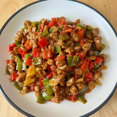 Chinese diced beef with peppers. Notice there is very little broth on the plate.