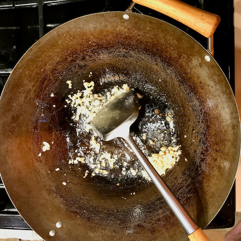 Stir-fry the garlic for 30 seconds then add the shrimp