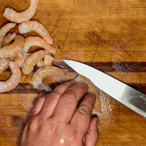 Slice the shrimp in half lengthwise