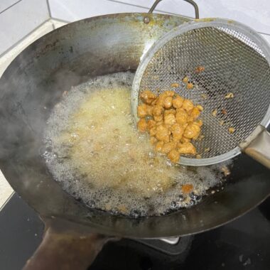 Dry-blanching, or oil-blanching, uses warm cooking oil instead of water.