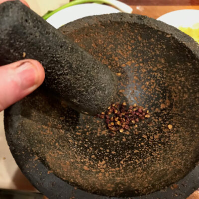 Grind the peppercorns