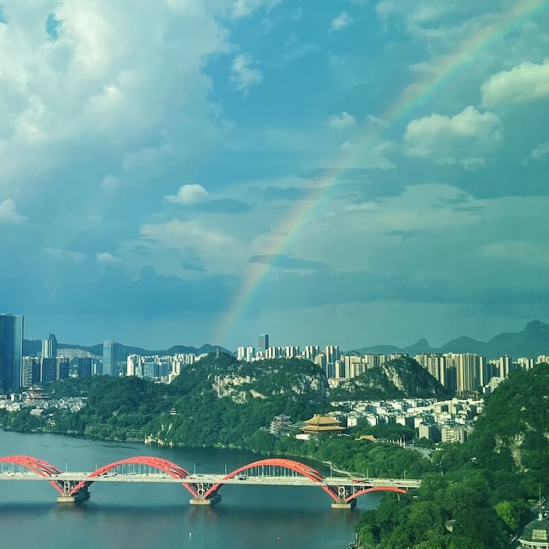 A rainbow is a sign of good luck. A trip to Liuzhou with my sister.