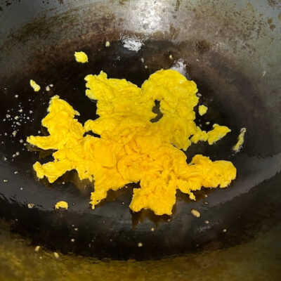 scramble the eggs, then set aside