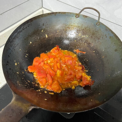 Saute the tomatoes