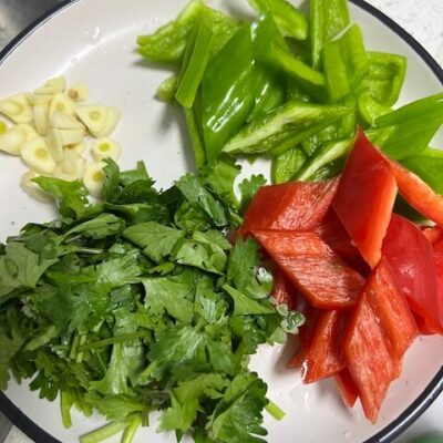 chop the peppers, cilantro and garlie