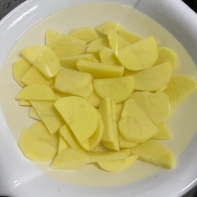 soak the potato slices in water to remove the starch