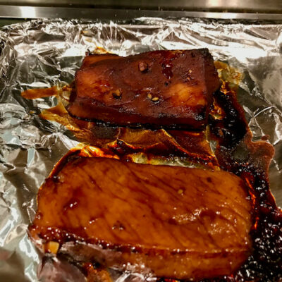 Cook on one side in the broiler until the top is nicely browned, like the piece in the rear, then turn over.