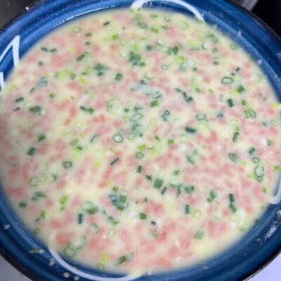 Mix water into the flour and egg mixture