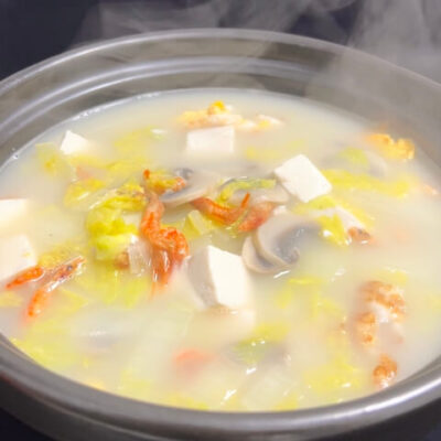 Tofu Soup with vegetables and egg, family style