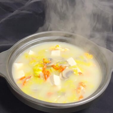 Tofu Soup with vegetables and egg, family style