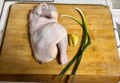 Chicken half, green onion, and ginger for Chinese Chicken Soup