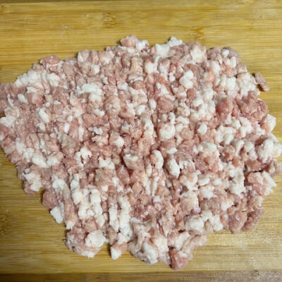 Chop the pork, but do not mince it.
