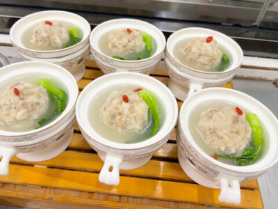 Stewed lion's head on the banquet table