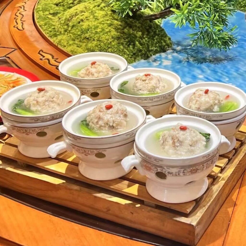 Stewed lion's head on the banquet table