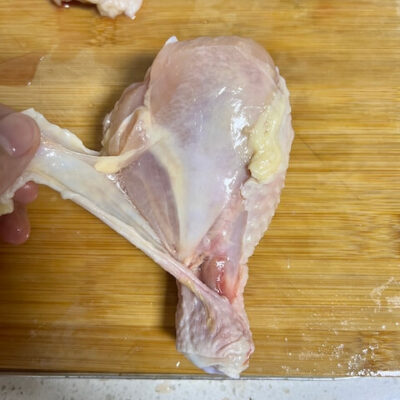 Remove the skin from the chicken legs