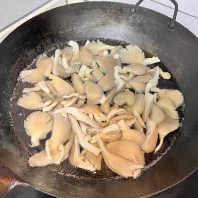Blanch the mushrooms