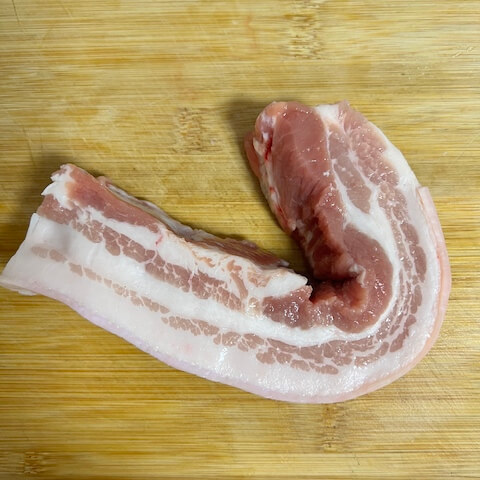 rinse the pork belly thoroughly and cut away the skin